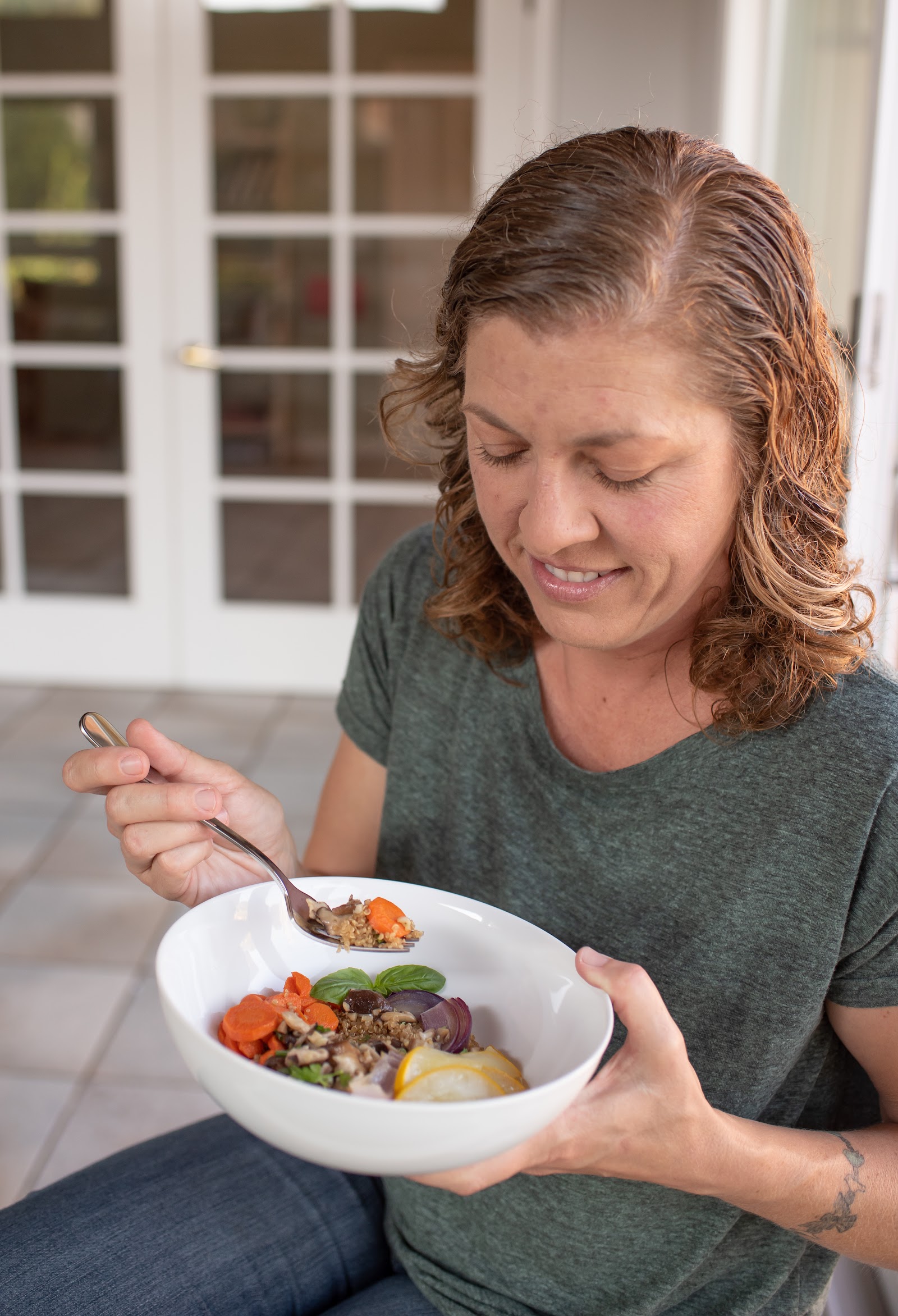 Client holding a food bowl